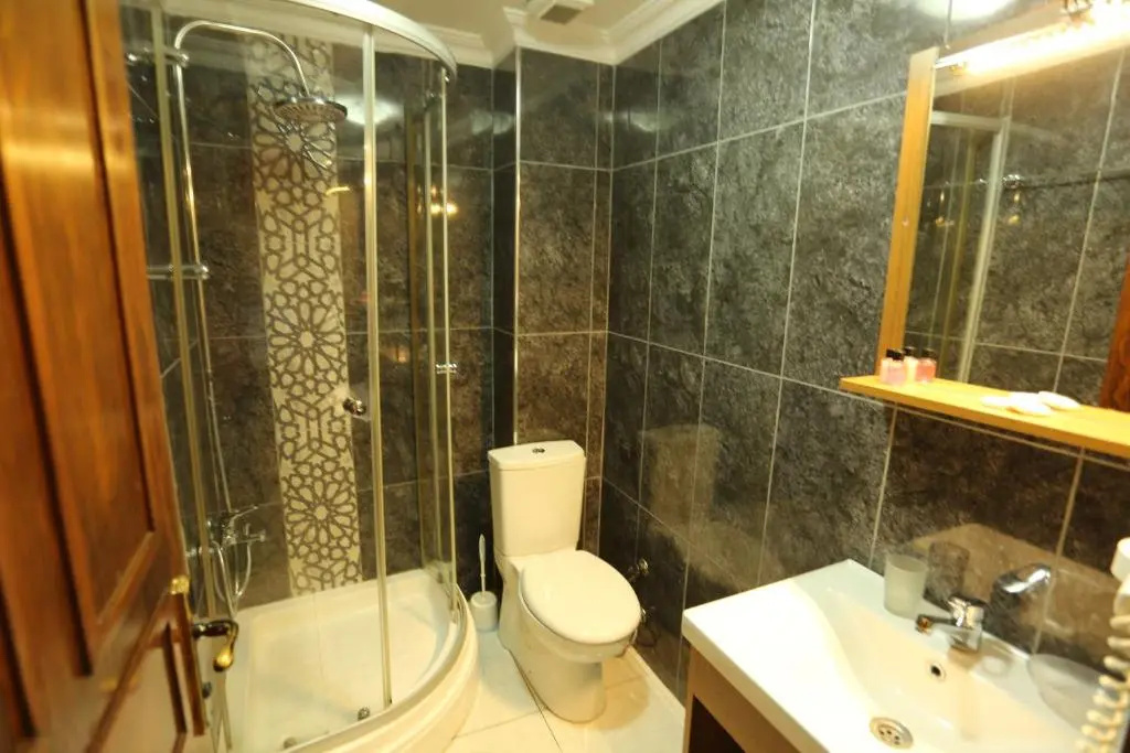 Tashkonak Studio Suites - Chambres