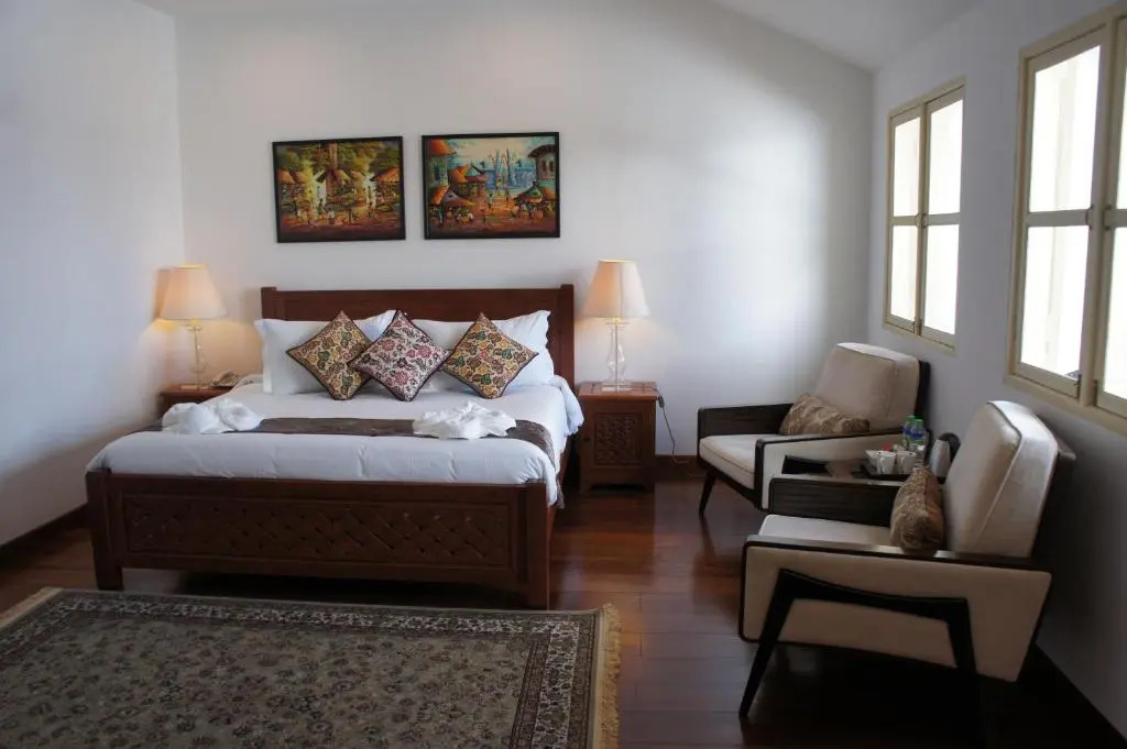 Heeren Palm Suites - Chambres