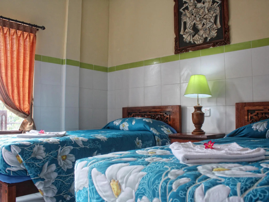 Sayang Maha Mertha Hotel - Chambres