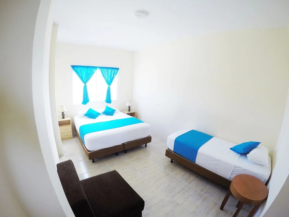 Standard Quadruple room beachfront