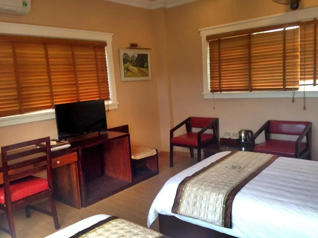 Hong Ky Boutique Hotel - Chambres