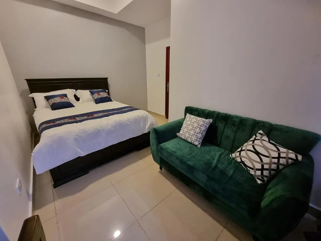 Kampala Suites - Chambres