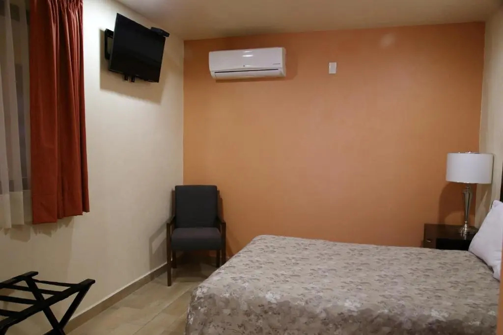 Hotel Plaza Bernal - Chambres