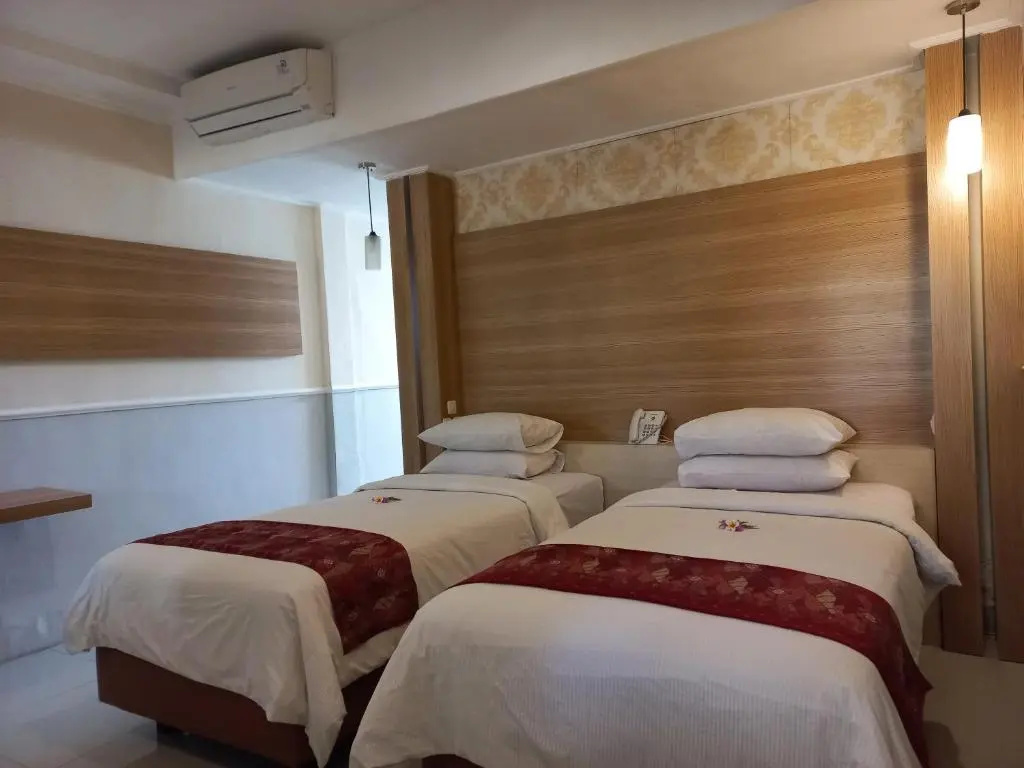 Bali Taman Lovina Resort and Spa Suites - Chambres