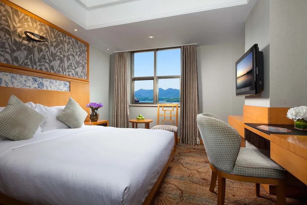 Huachen International Hotel - Chambres