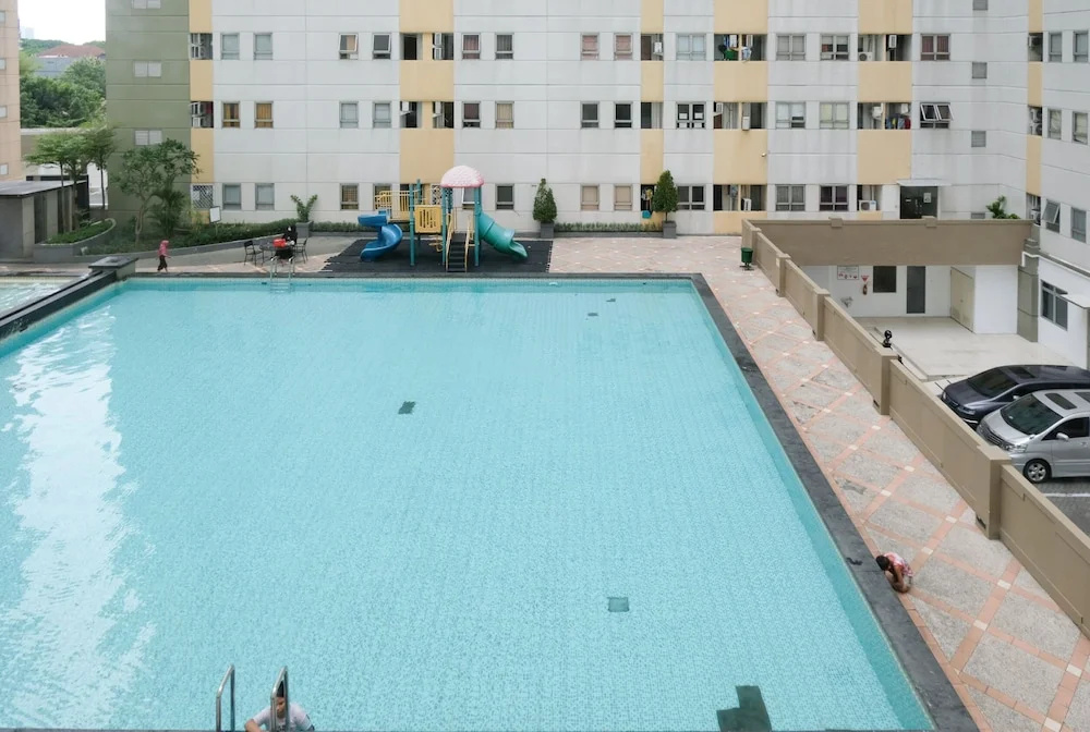 Homey 2Br At Puncak Permai Apartment