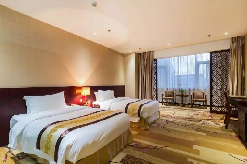 Junyi Runhua Hotel - Chambres