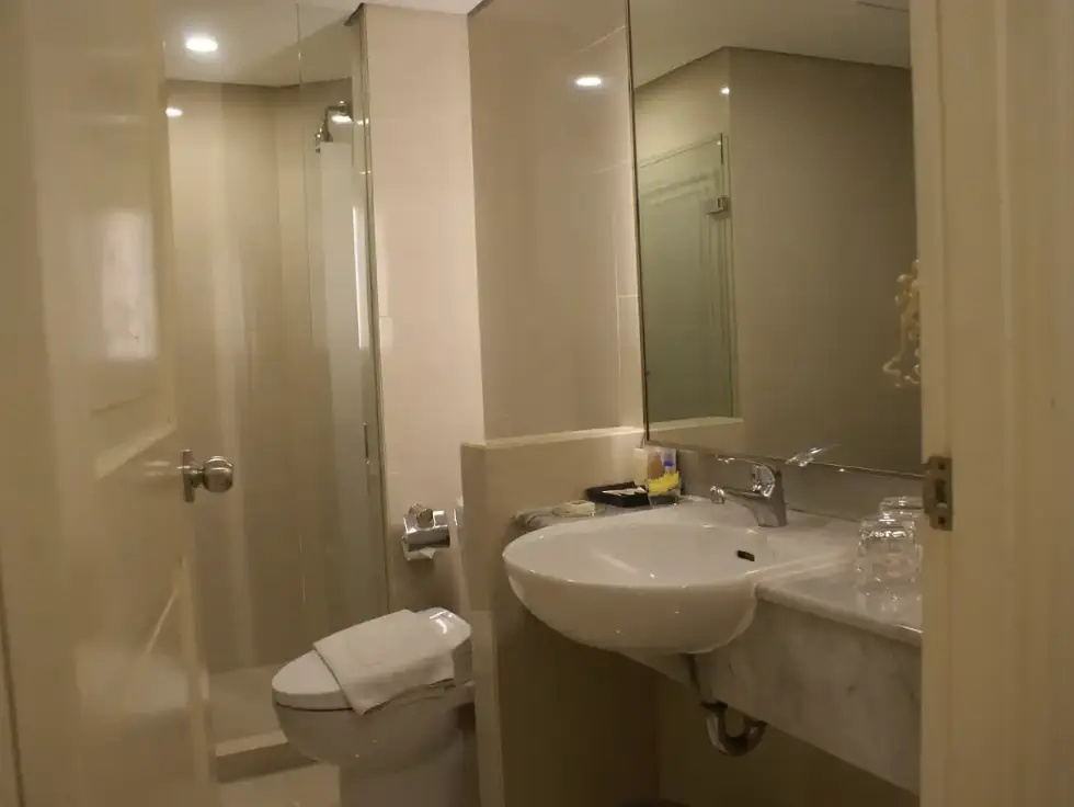 Grand Tropic Suites Hotel - Chambres