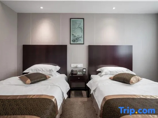Guilong Hotel - Chambres