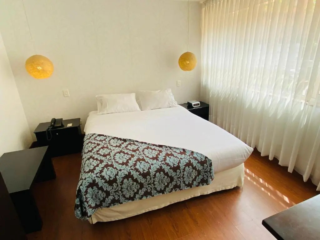 Hotel Retiro 84 - Chambres