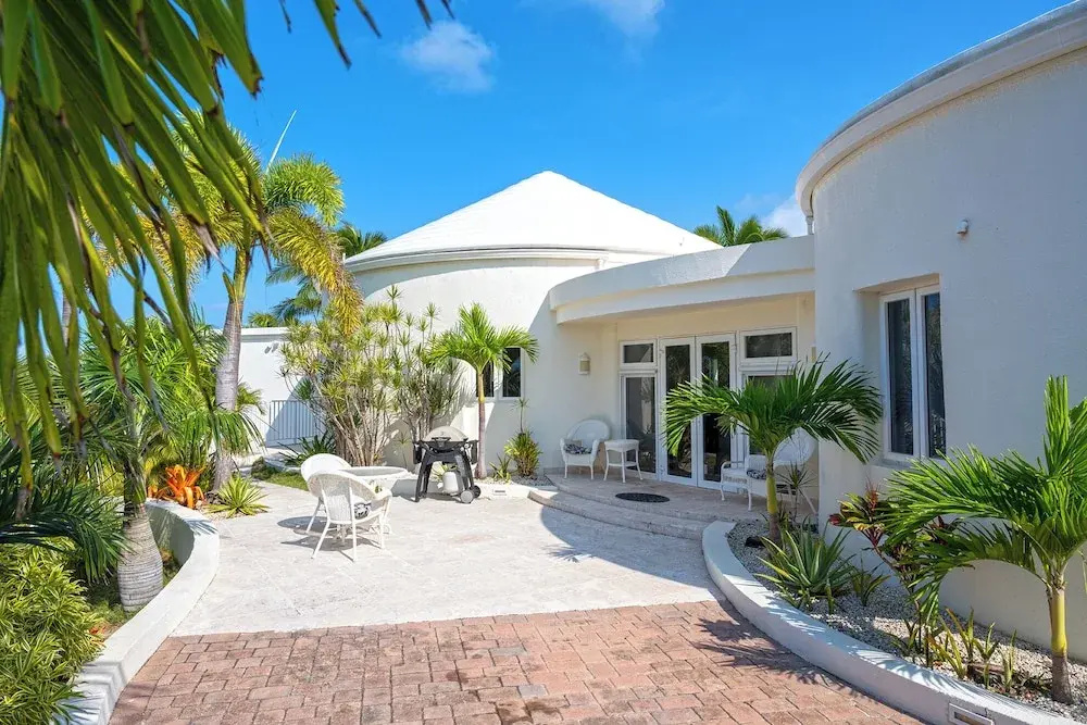 Exquisite Retreat: Contemporary Estate On Pink Sand Beach