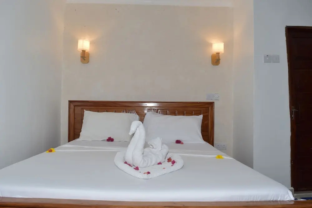 Chukwani Executive Inn - Chambres