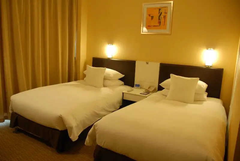Gloria Plaza Hotel Kangqiao - Chambres