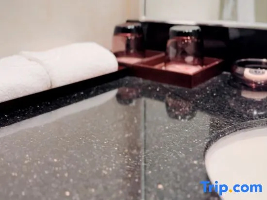 NCEC Jinyuan Hotel - Chambres