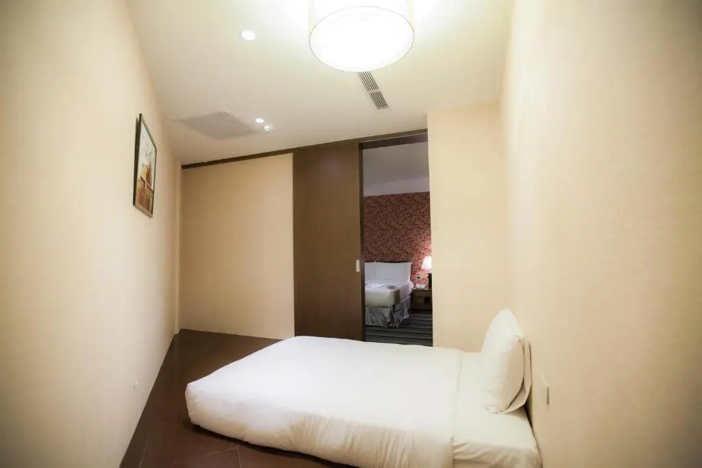 Kai Shen Sinsu Hotel - Chambres