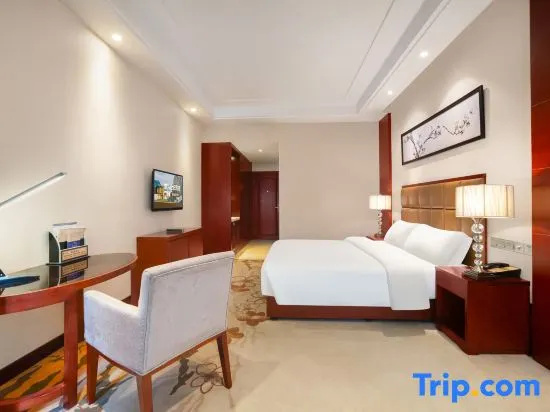 Xinxing Century Hotel - Chambres