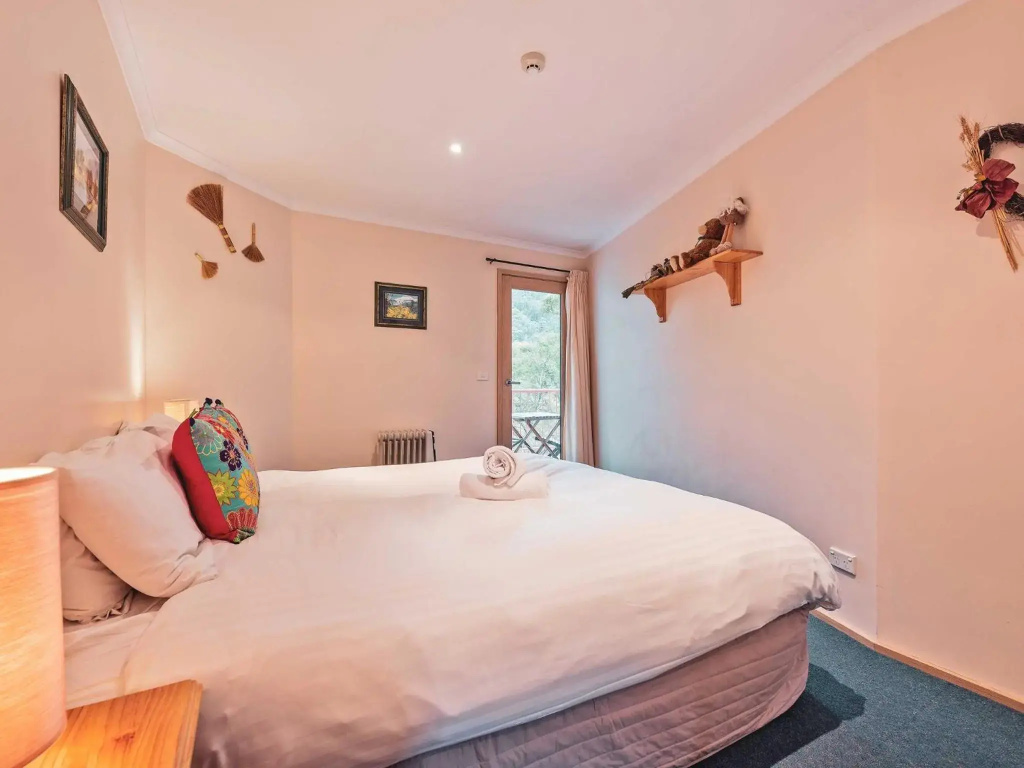 Lhotsky 2 Bedroom with fireplace and sweeping mountain view