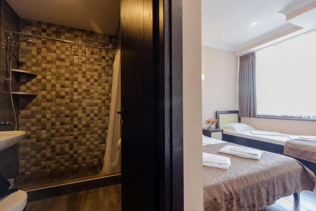 GNS Hotel - Chambres