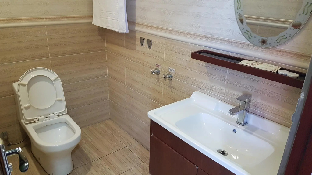 Suwara Hotel - Chambres