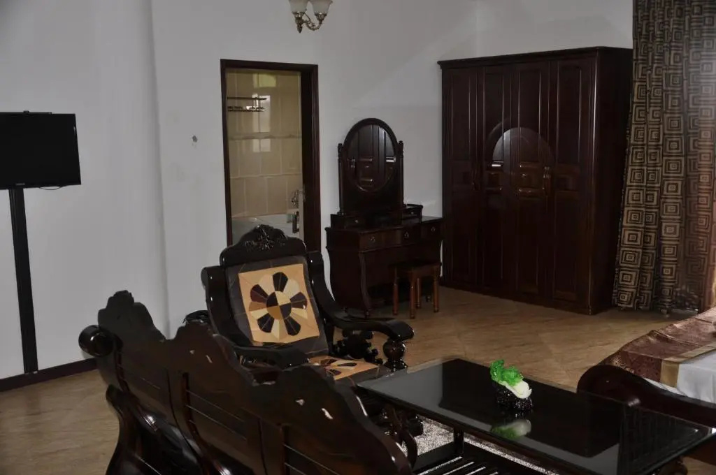 Biraj International Hotel - Chambres