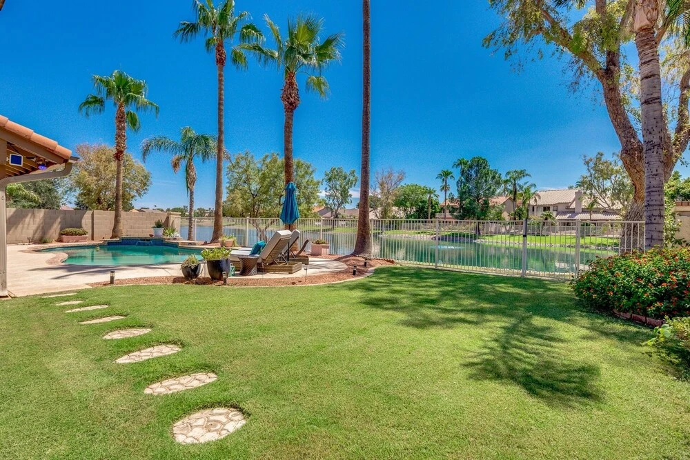 Updated waterfront home w/ private Heated pool & garage. Near Arrowhead shops! by RedAwning, Glendale
