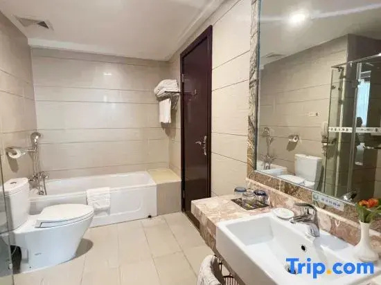 Longzhu Hotel - Chambres