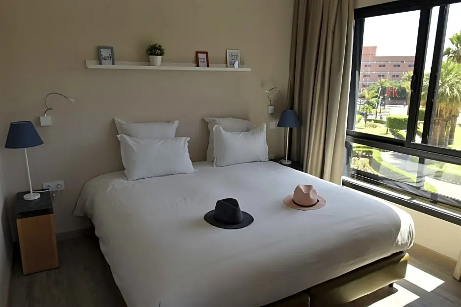 Amani Hotel Suites & Spa - Chambres