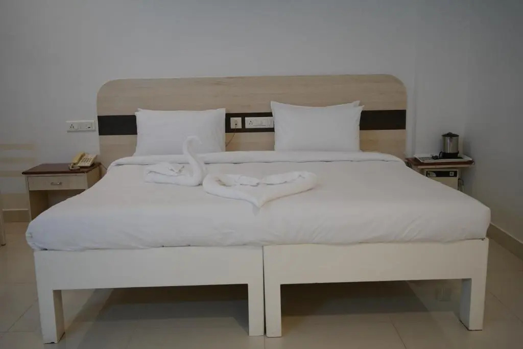 Hotel Palmyra Grand Inn - Chambres