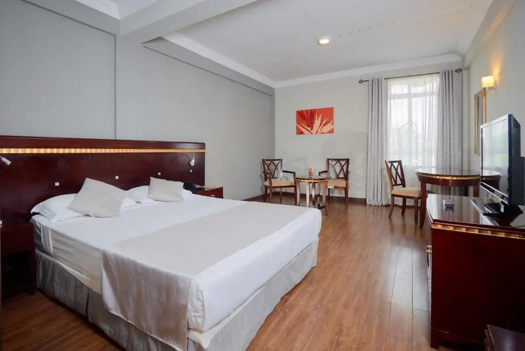 Gold Crest Hotel - Chambres