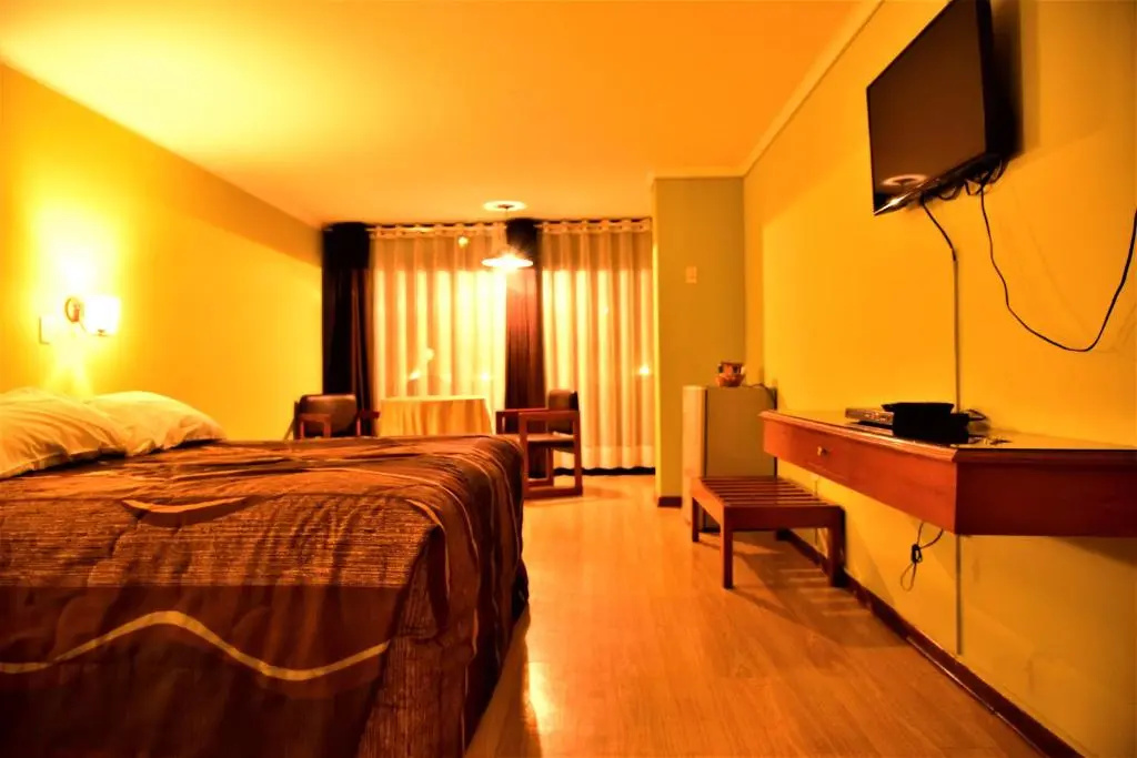 Hotel Holiday Suites - Chambres