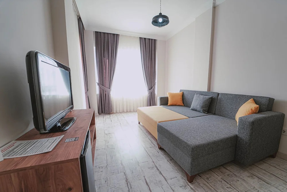 Апартаменты Comfort в Voswos Garage Coffee & Hotel