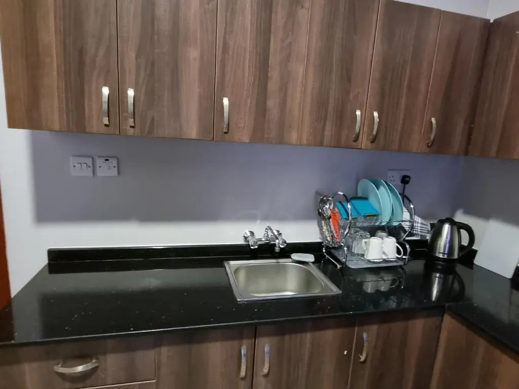 Kampala Suites - Chambres