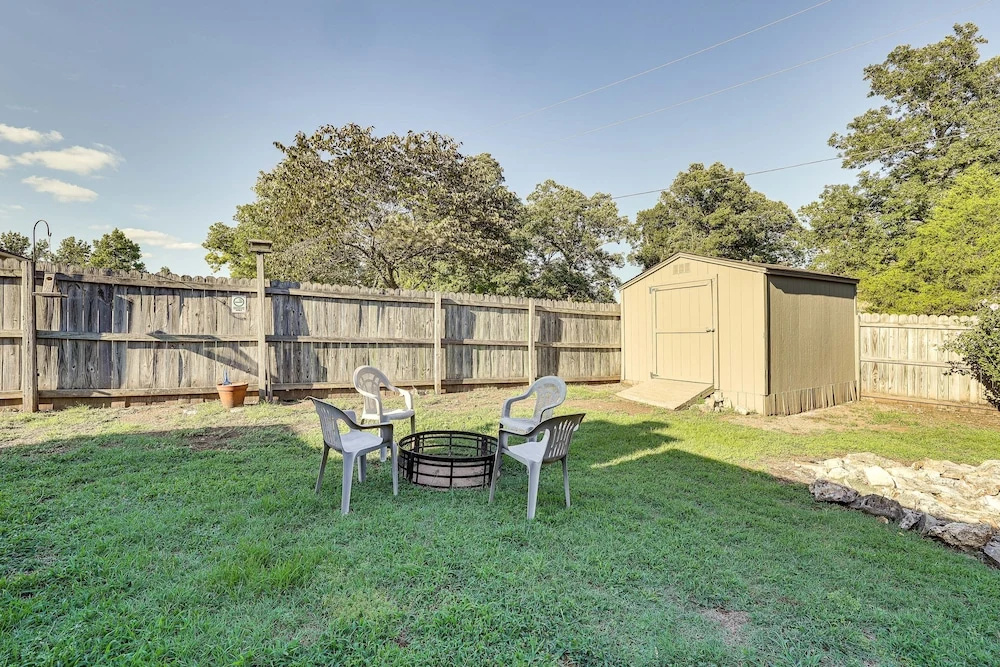 Holiday Island Home w/ Screened-in Deck & Fire Pit