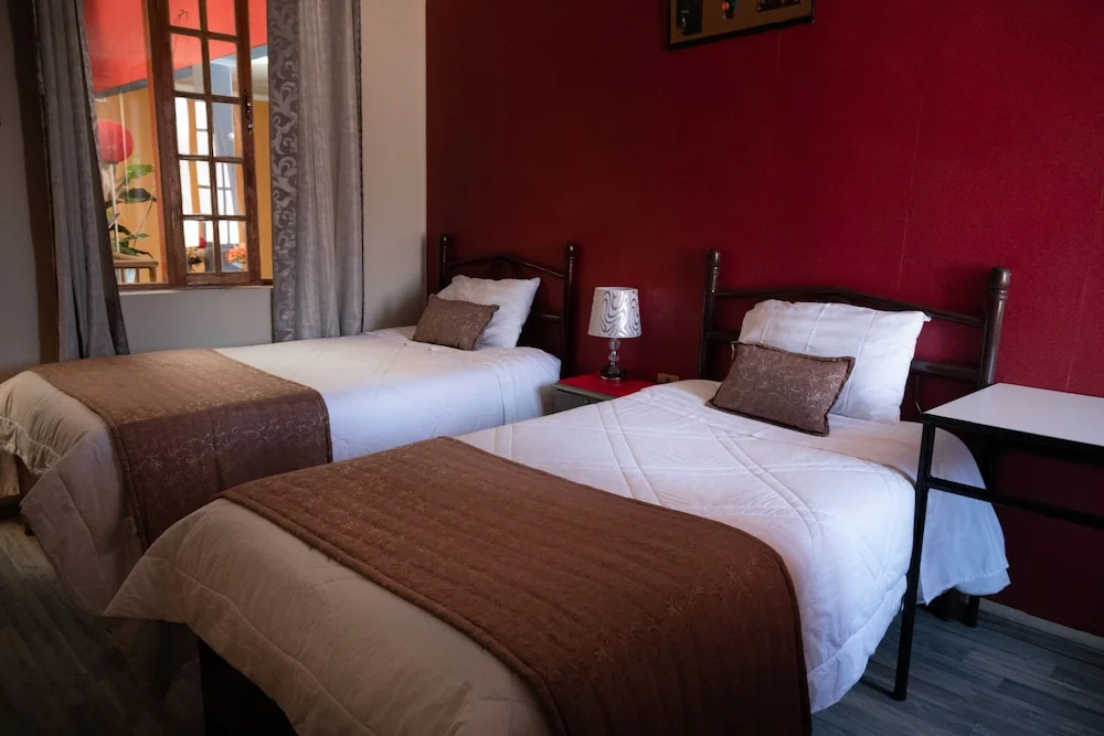 Tonito Hotel - Chambres