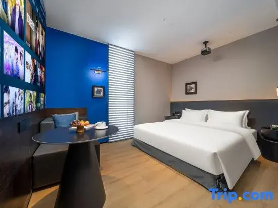 Kunlong Hotel - Chambres