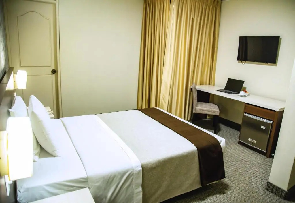 Palmetto Hotel Business La Perla - Chambres