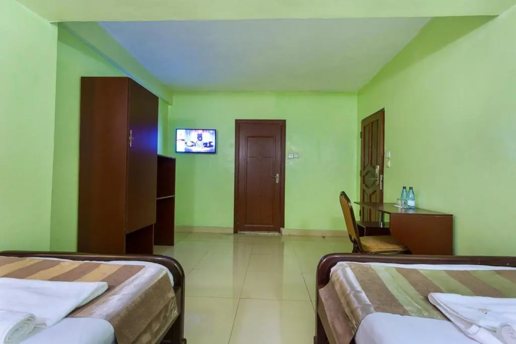 The Legacy Hotel & Suites - Chambres