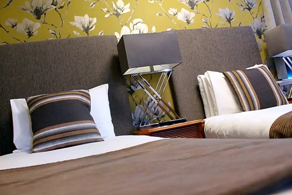 De Rougemont Manor Hotel & Suites - Chambres
