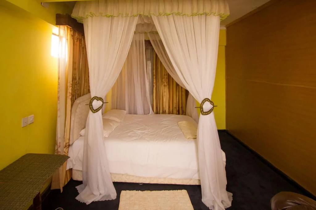 New Zonic Hotel - Chambres