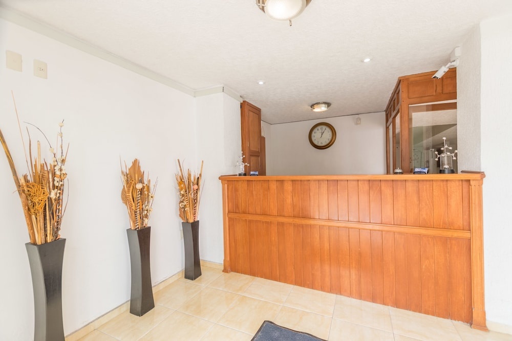 Suites Poliforum Inn — 2