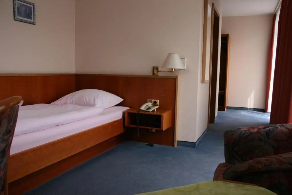 Atrium Hotel - Chambres