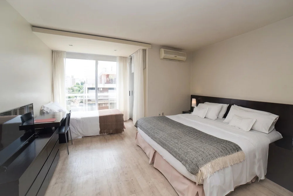 Standard Triple room with balcony and with city view