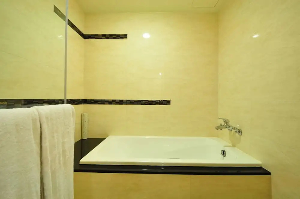 Goodness Plaza Hotel - Chambres