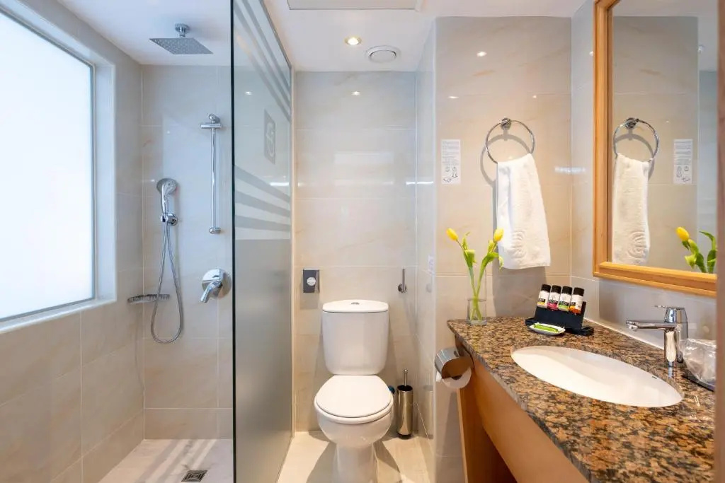 Constantinou Bros Athena Beach Hotel - Chambres