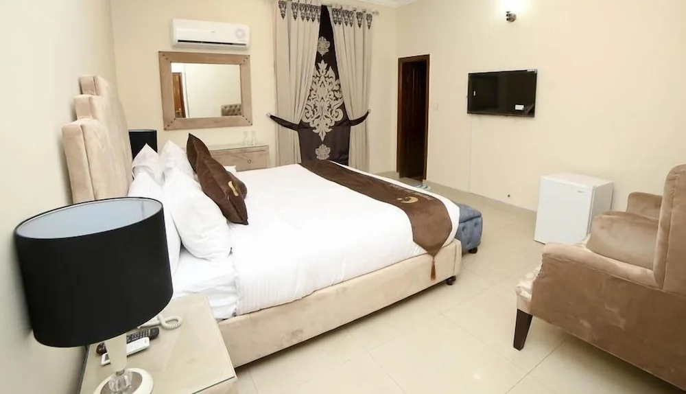 Hotel Premier Inn Grand - Chambres