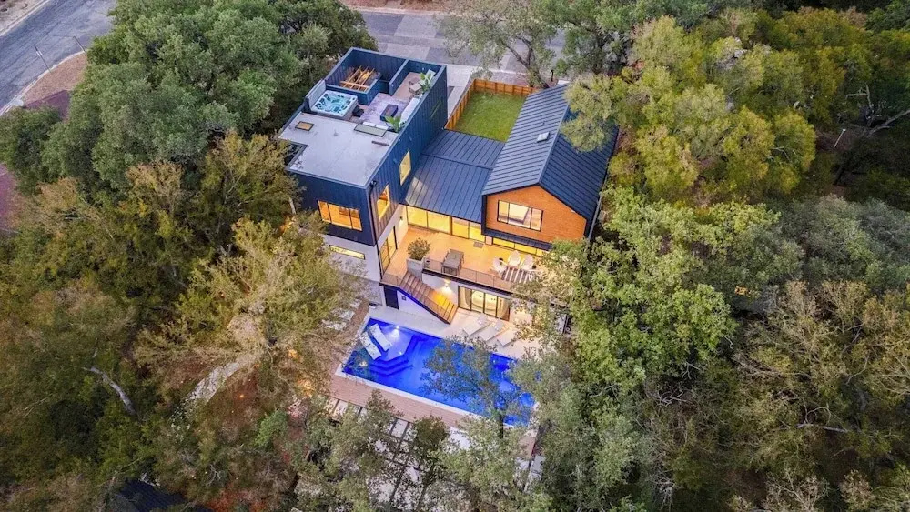 Modern Oasis w/ Pool, Hot Tub, Rooftop Deck & Home Theater Mariposa Retreat by Avantstay