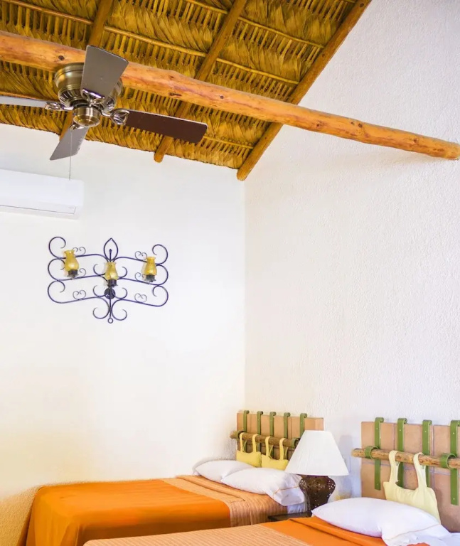 Hotel Palmas De Cortez - Chambres