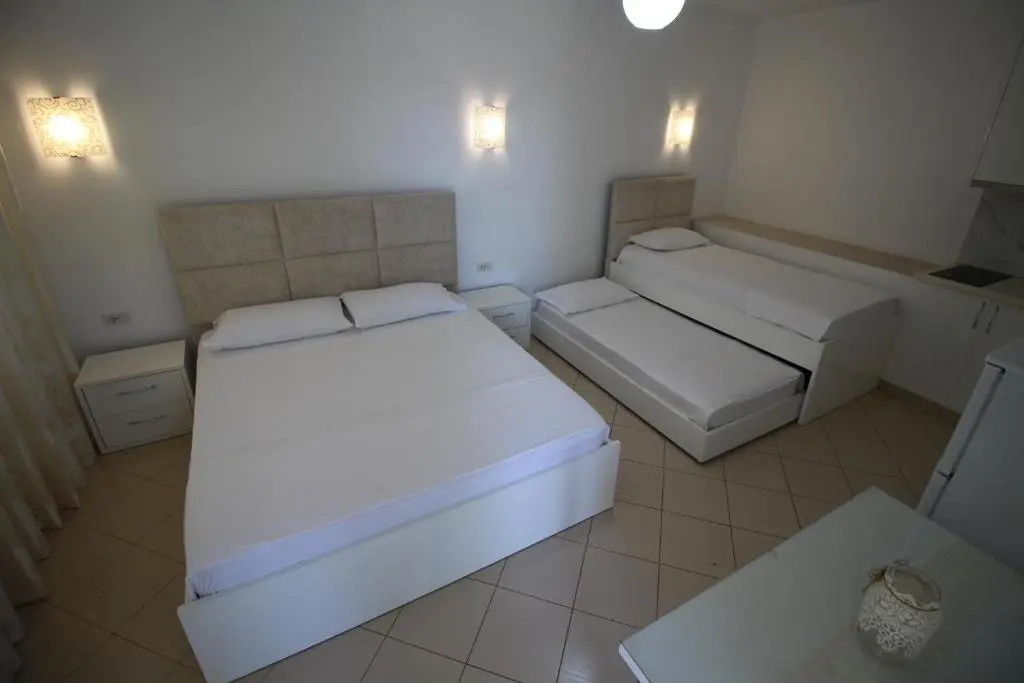 Standard Quadruple room with garden view