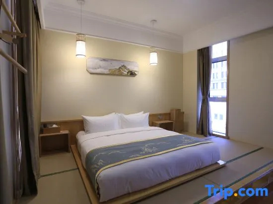 Gloria Plaza Hotel Qingdao - Chambres