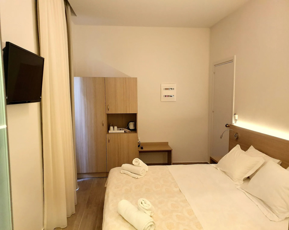 Caravel Apartment Hotel - Chambres